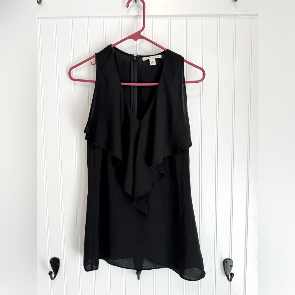 Banana Republic women's size two black dress top.  Zippers up back.